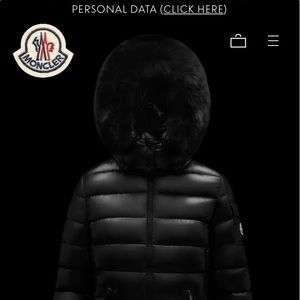 Black Moncler jacket. Fur in hood. No stains rips. PERFECT condition.